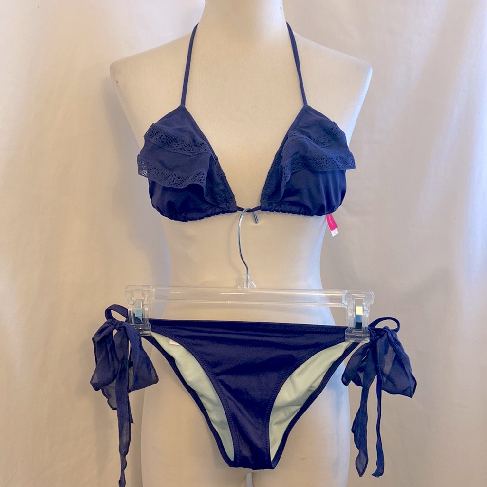 VICTORIA’S SECRET Ruffle Swim; Top:Triangle Tie Back (M);Bottom: The Cheeky (SM)